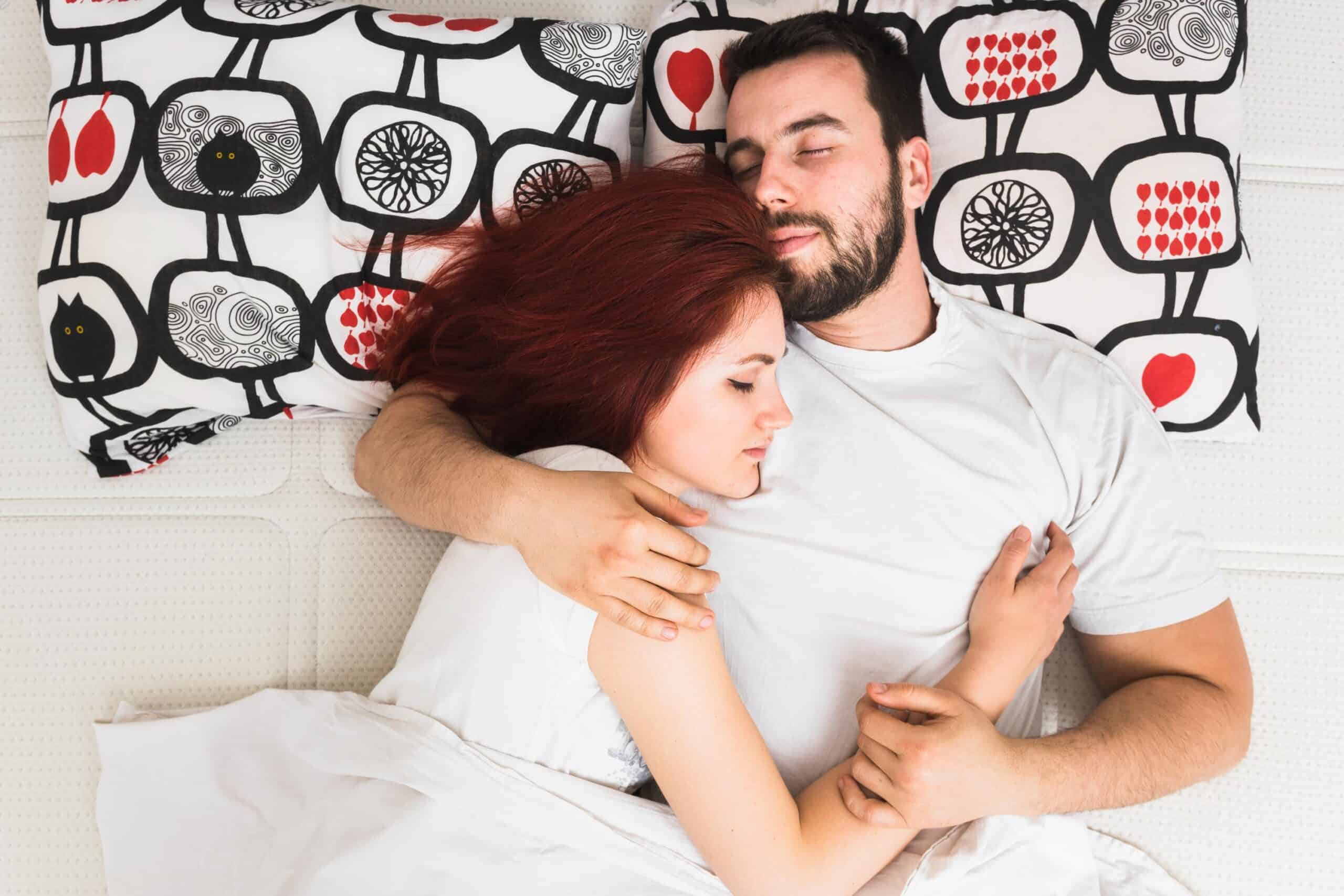 Blood Flow vs Hormones in Sexual Performance in Denville, NJ: What Actually Drives Libido Loss 3 elevated view couple sleeping together bed scaled